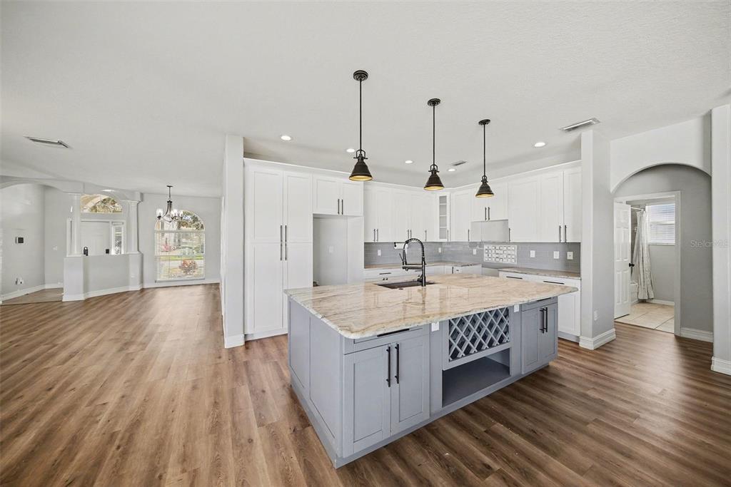4809 Walnut Ridge Road Land O' Lakes, FL 34638 - Photo 5 of 34 a spacious bathroom with double vanity and a sink