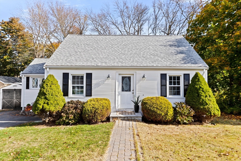 35 Red Jacket Road Weymouth, MA 02190 - Photo 1 of 33 a front view of a house with a yard and garage