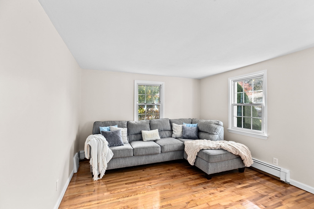 35 Red Jacket Road Weymouth, MA 02190 - Photo 17 of 33 a living room with furniture and a window
