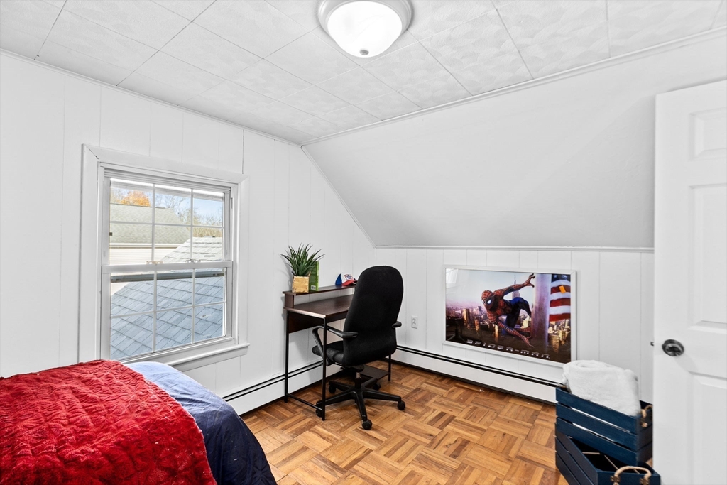 35 Red Jacket Road Weymouth, MA 02190 - Photo 23 of 33 a bedroom with furniture and a painting on the wall