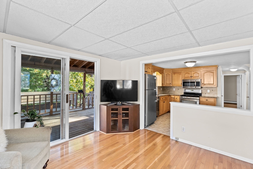 35 Red Jacket Road Weymouth, MA 02190 - Photo 4 of 33 a kitchen with microwave a stove and furniture