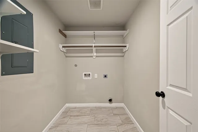 a view of a room with racks on the wall