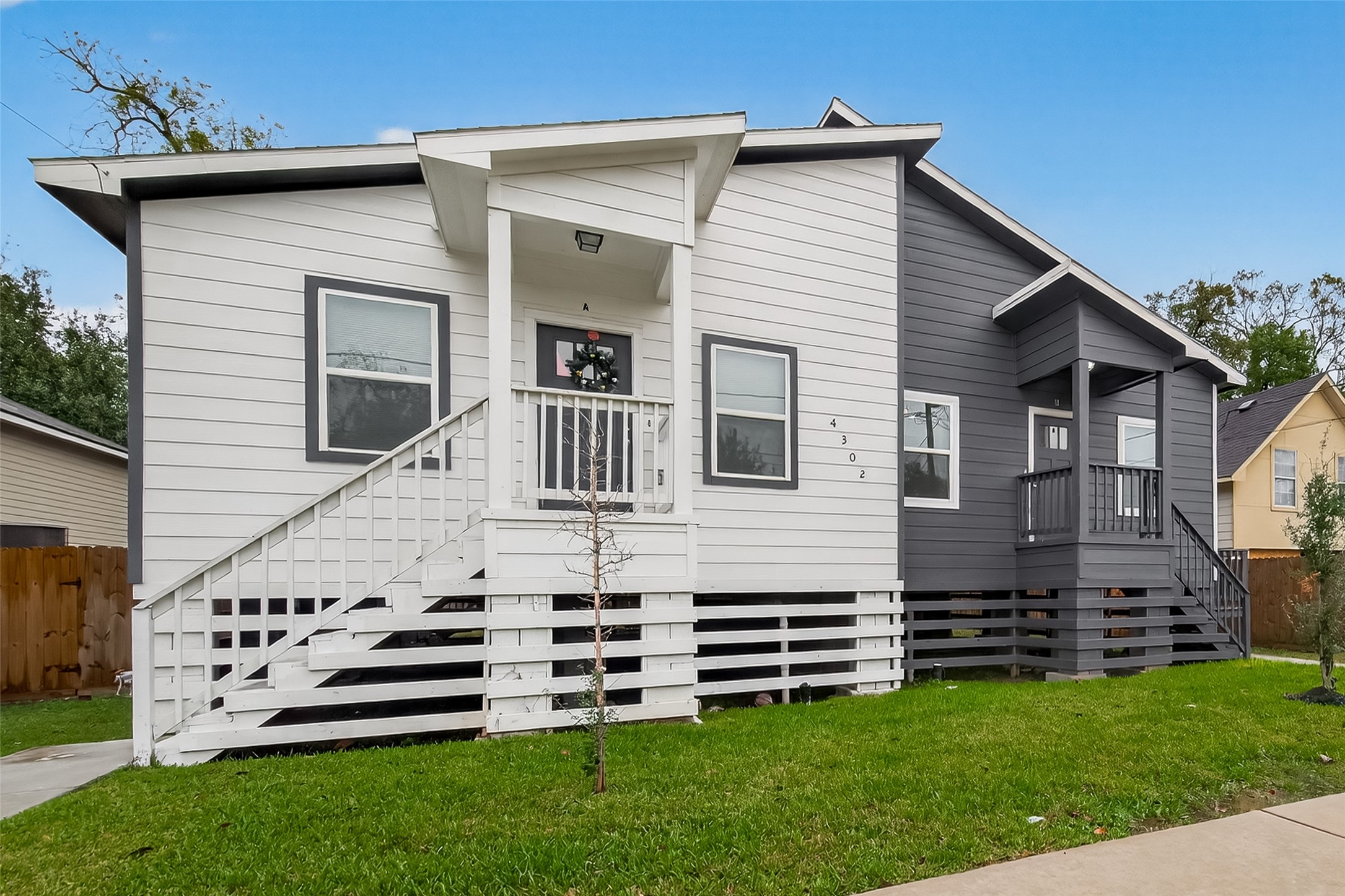4302 Hirsch Road, Unit B Houston, TX 77026 - Photo 2 of 30 a view of a house with a yard