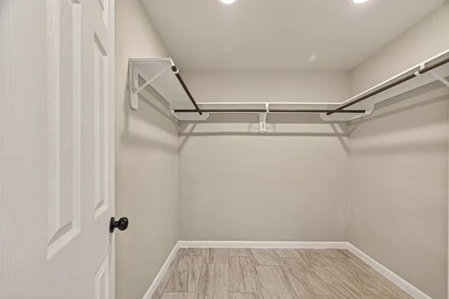 a view of a room with racks on the wall