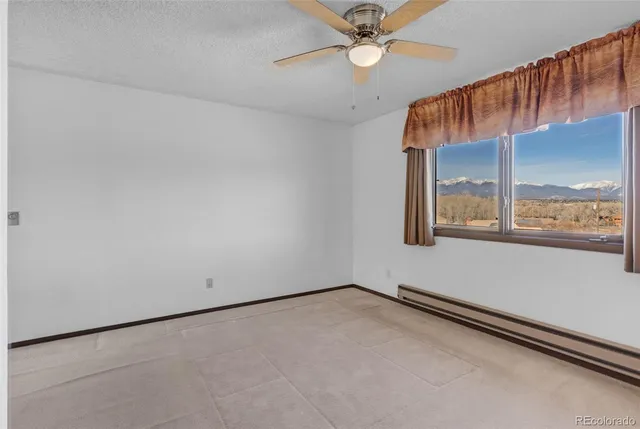 a picture of a bathroom with a shower