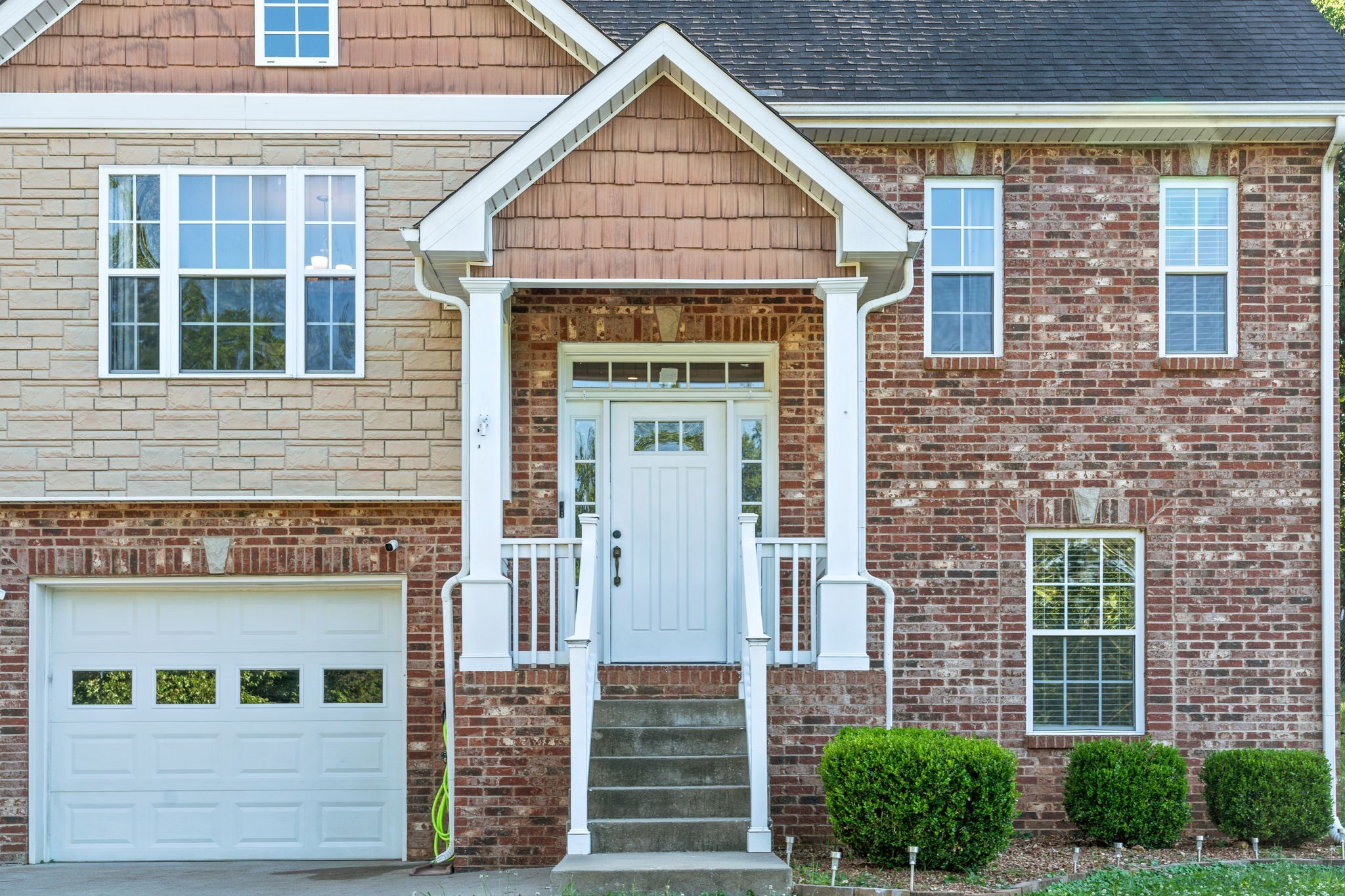 1148 York Meadows Road Clarksville, TN 37042 - Photo 2 of 35 a view of a brick house with large windows