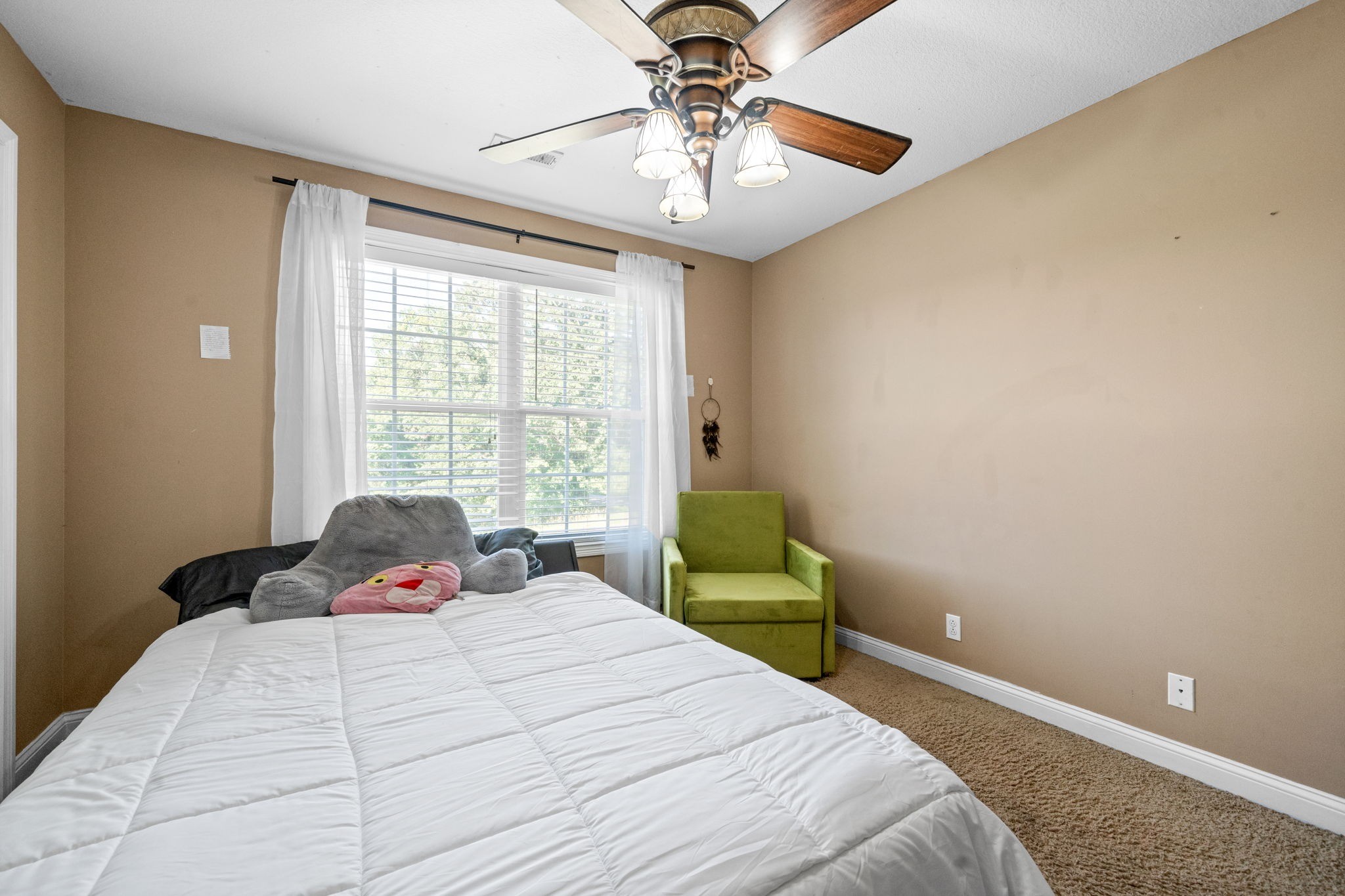 1148 York Meadows Road Clarksville, TN 37042 - Photo 24 of 35 a bedroom with a bed and window