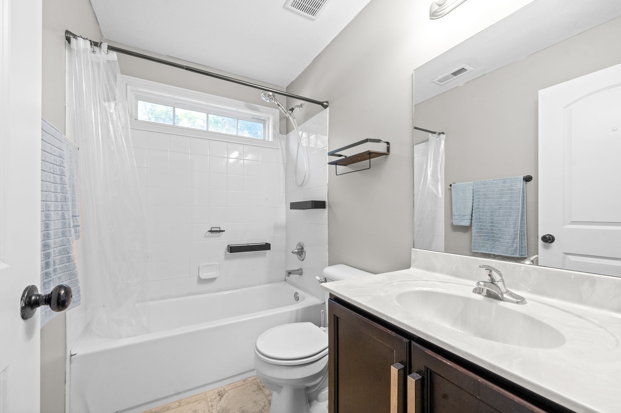 1148 York Meadows Road Clarksville, TN 37042 - Photo 25 of 35 a bathroom with a granite countertop sink toilet and shower