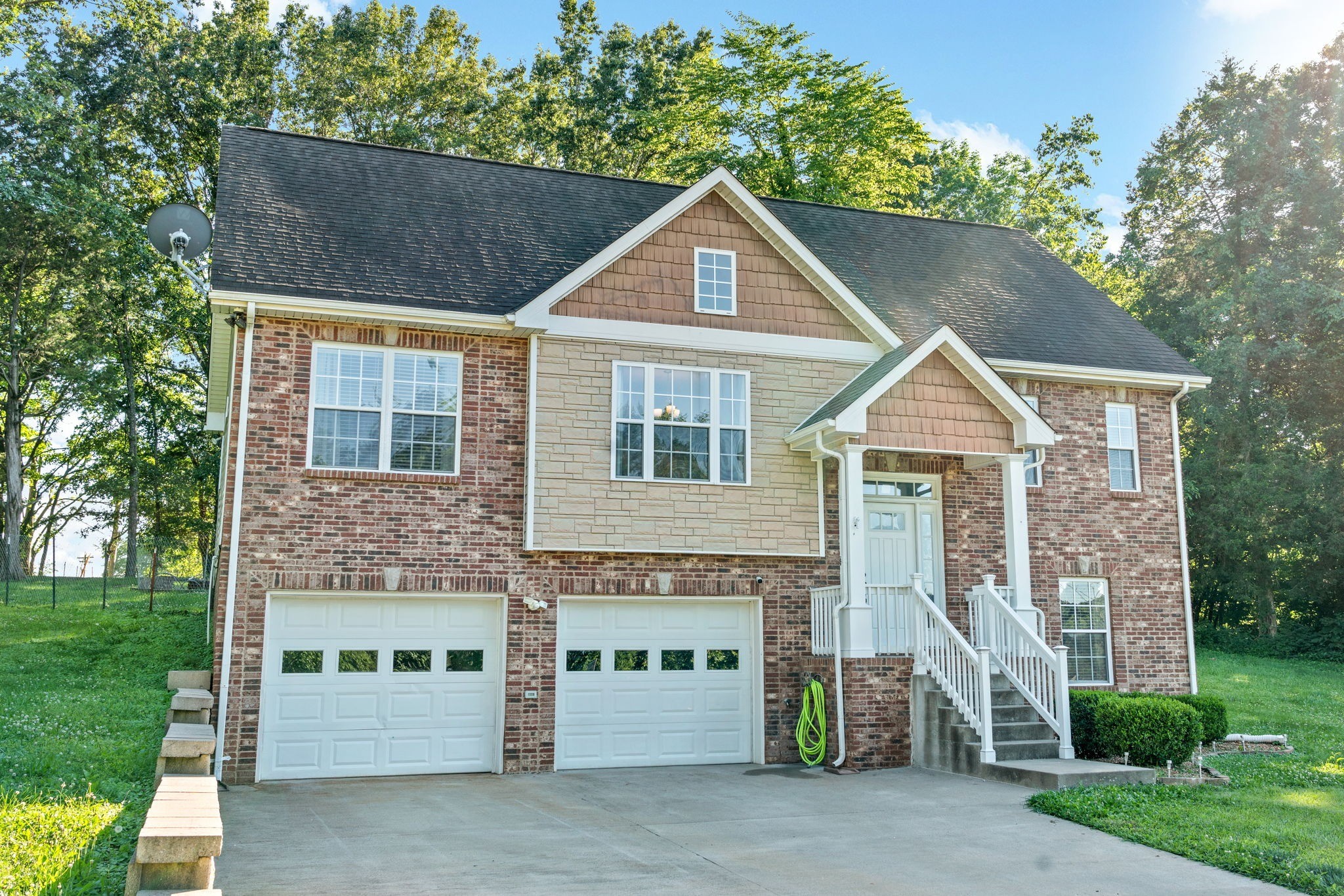 1148 York Meadows Road Clarksville, TN 37042 - Photo 3 of 35 a front view of a house with a garden