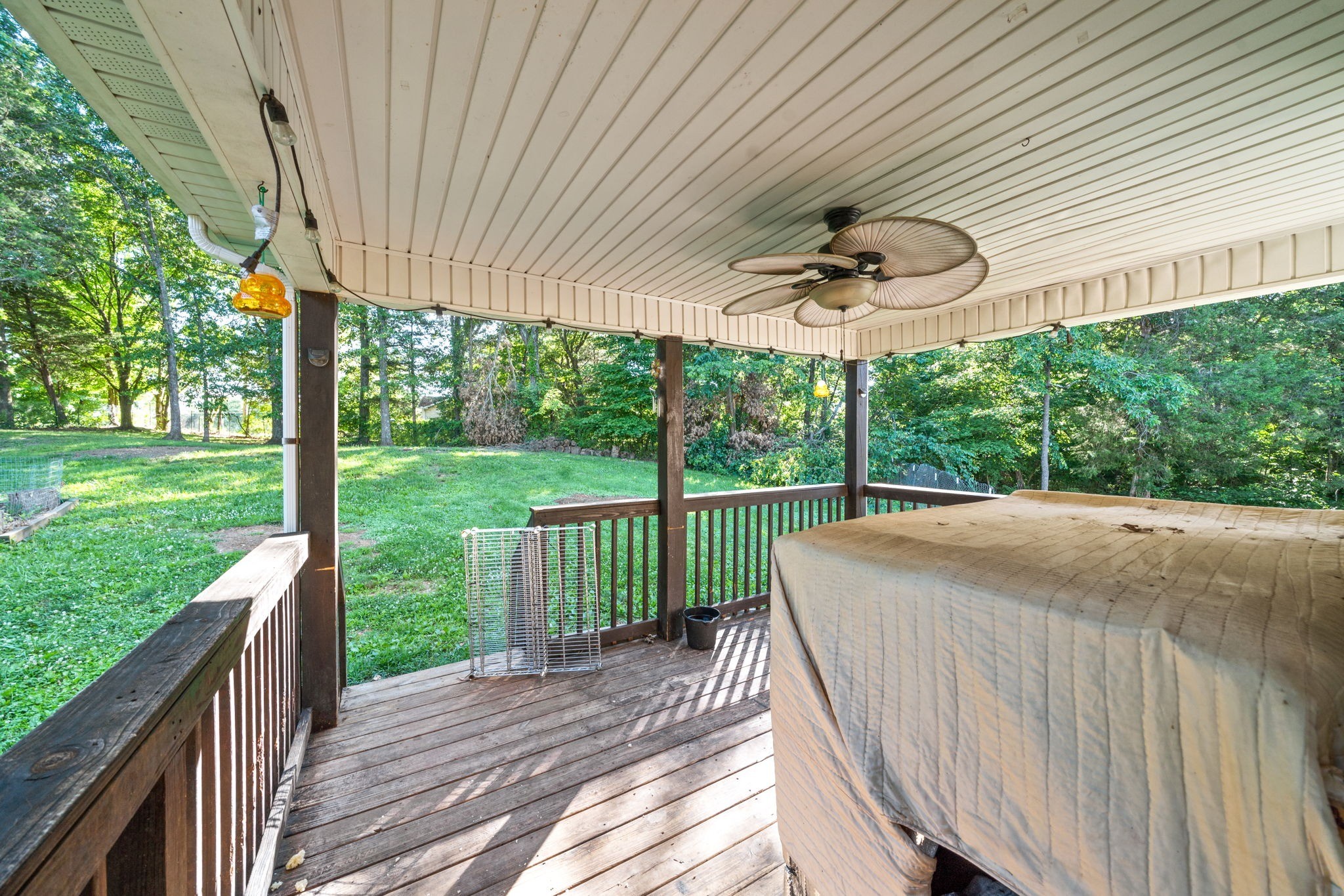 1148 York Meadows Road Clarksville, TN 37042 - Photo 31 of 35 a view of a deck with a table chairs and a backyard