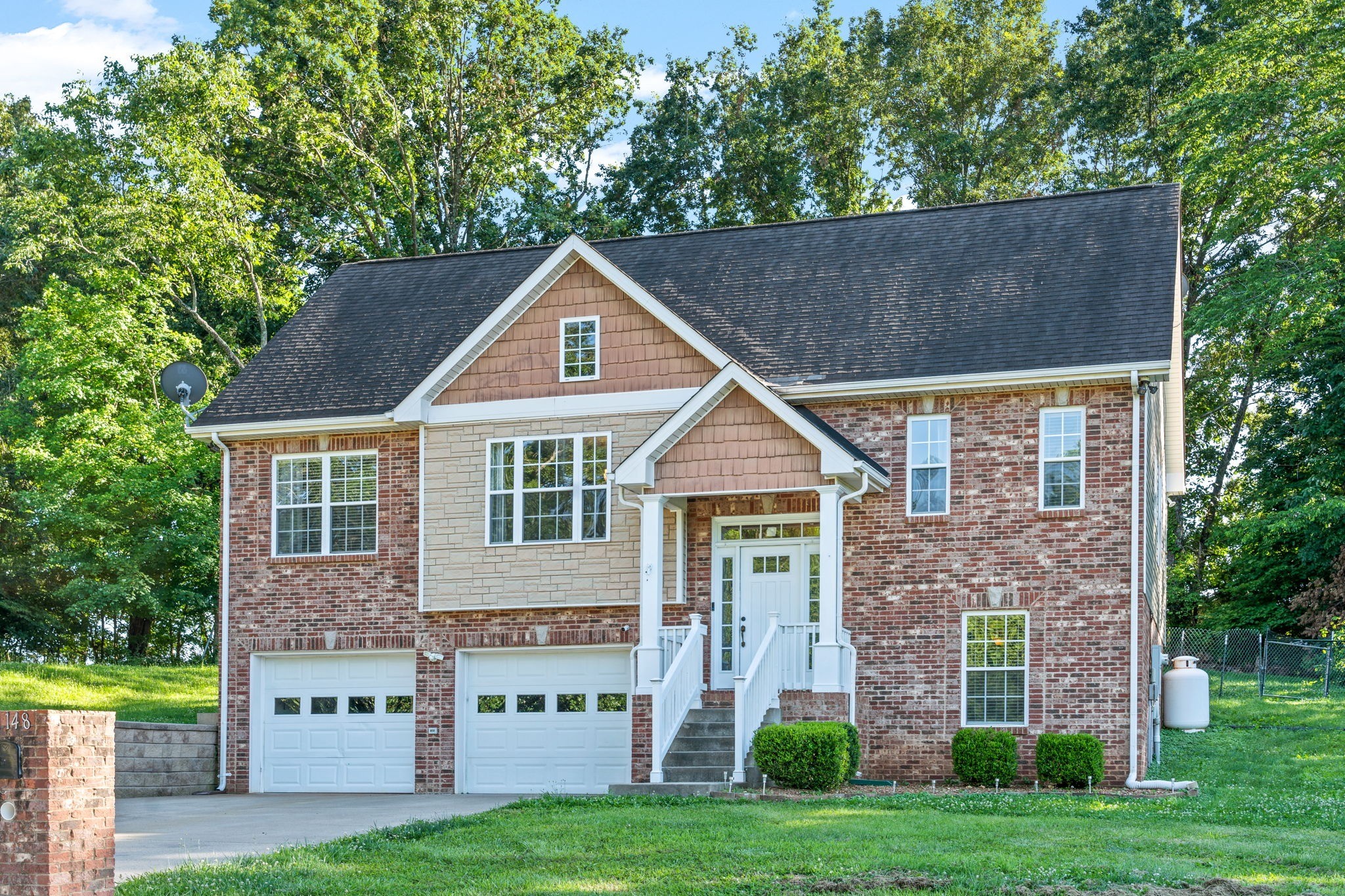 1148 York Meadows Road Clarksville, TN 37042 - Photo 4 of 35 a front view of a house with a yard
