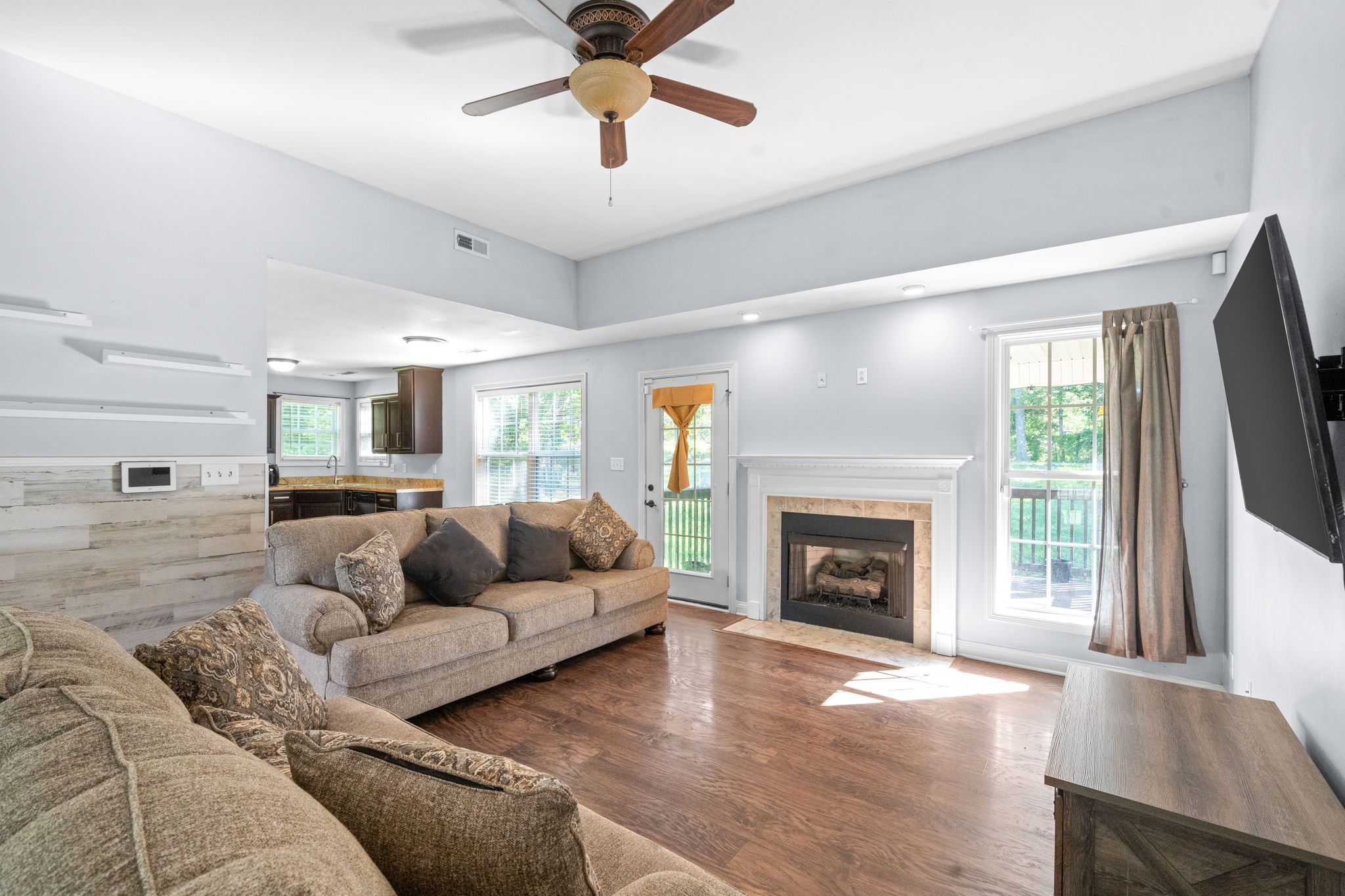 1148 York Meadows Road Clarksville, TN 37042 - Photo 7 of 35 a living room with furniture and a fireplace