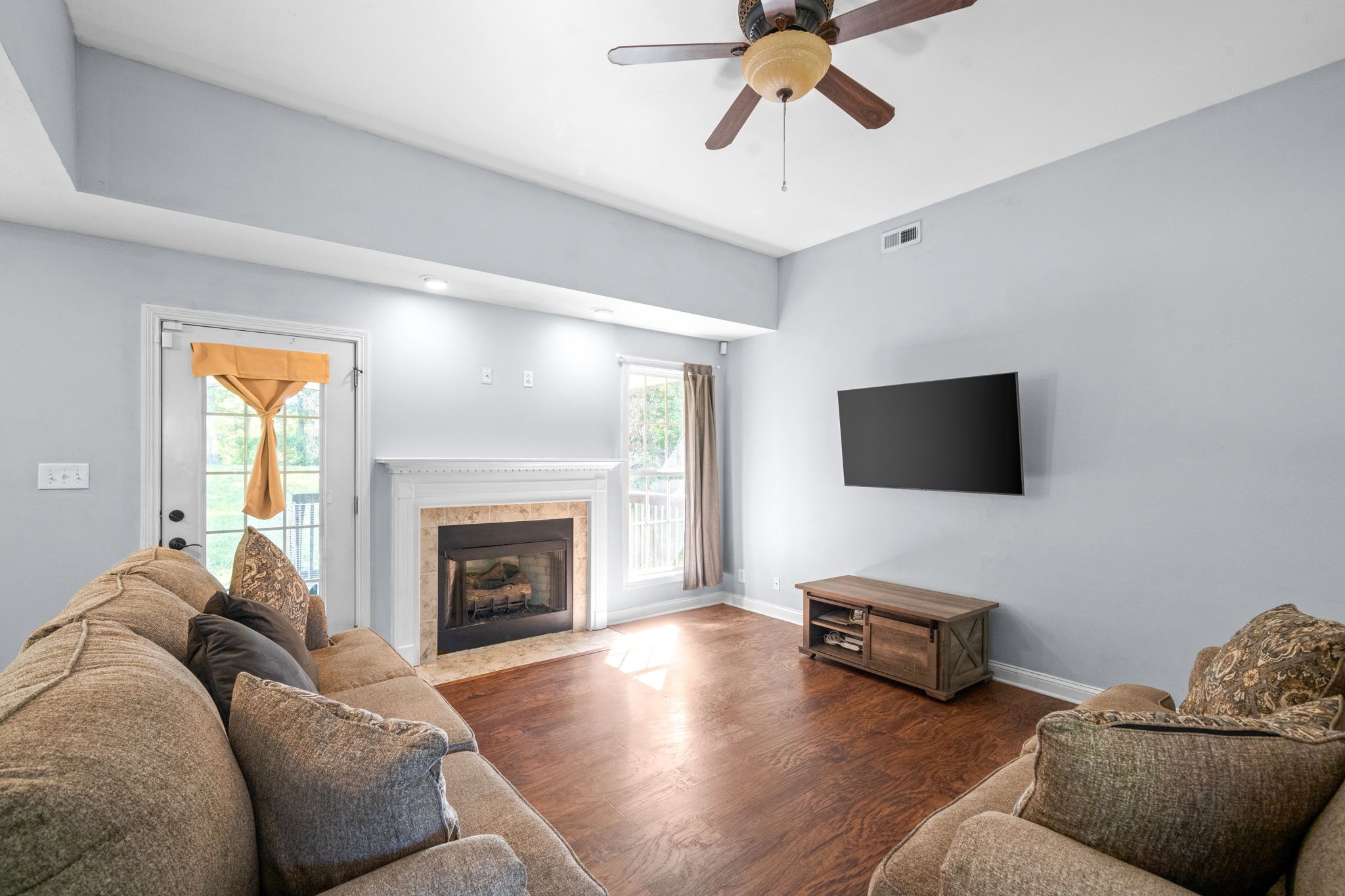 1148 York Meadows Road Clarksville, TN 37042 - Photo 8 of 35 a living room with furniture and a fireplace