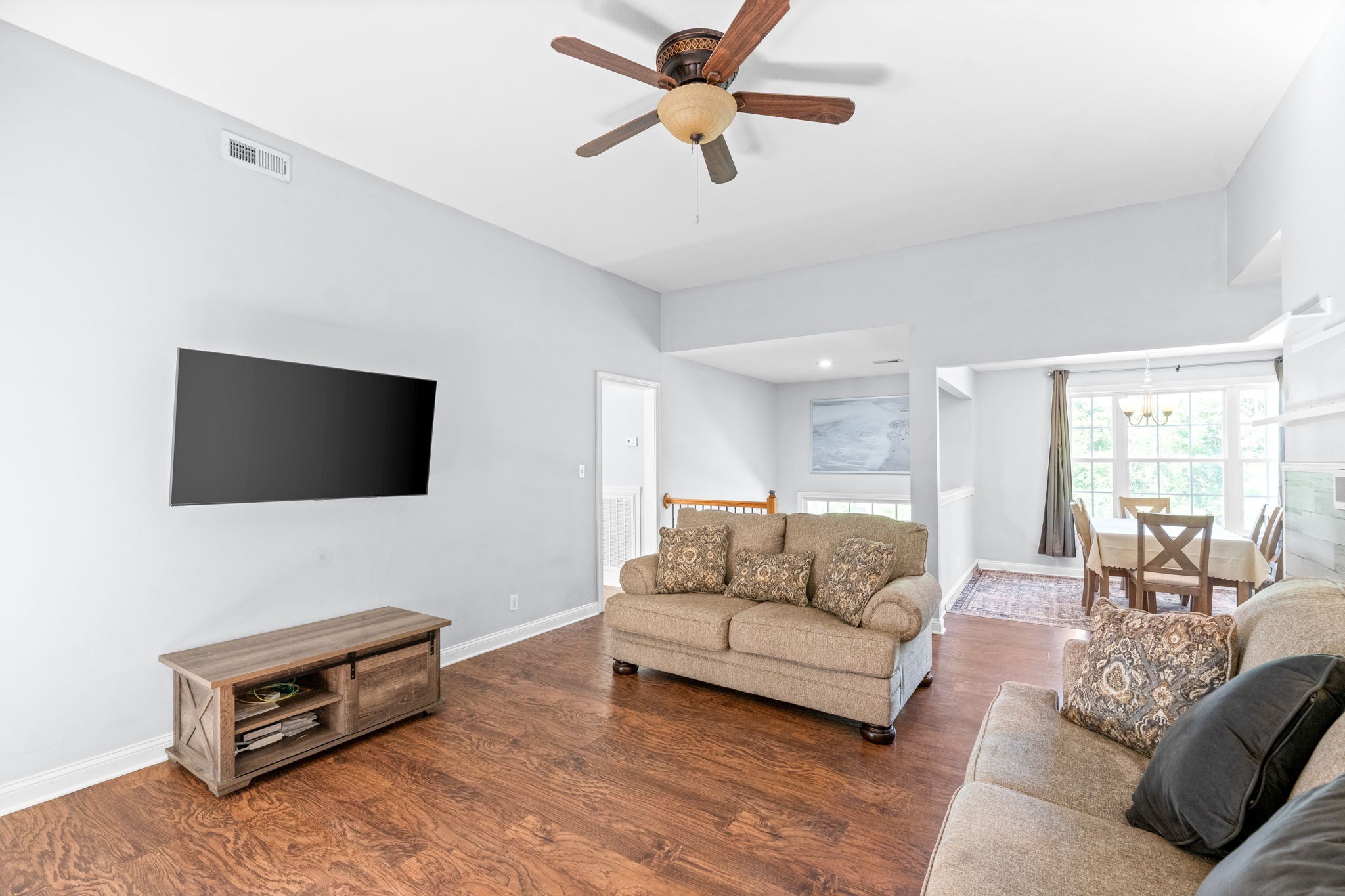 1148 York Meadows Road Clarksville, TN 37042 - Photo 9 of 35 a living room with furniture and a flat screen tv