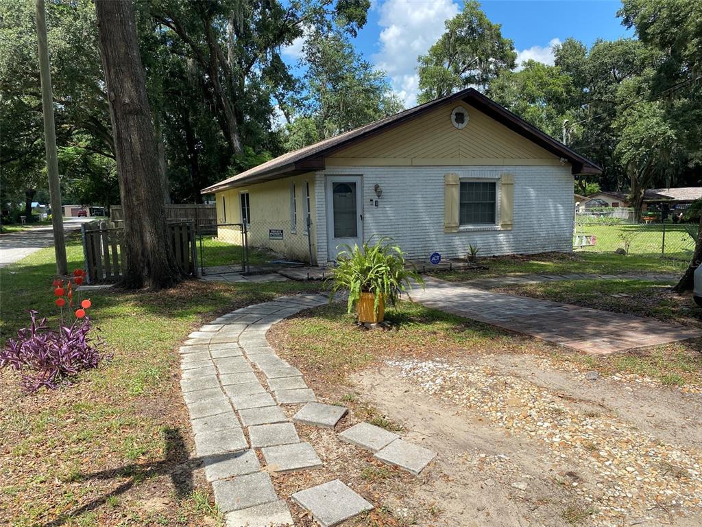 502 Tweed Avenue Seffner, FL 33584 - Photo 1 of 1 a front view of a house with garden