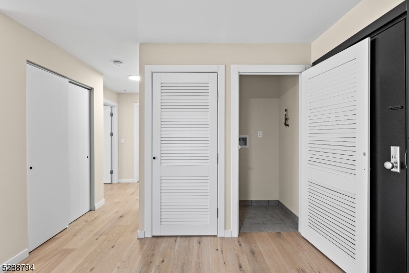 172 6th Street, Unit 54 Passaic, NJ 07055 - Photo 7 of 13 an empty room with wooden floor