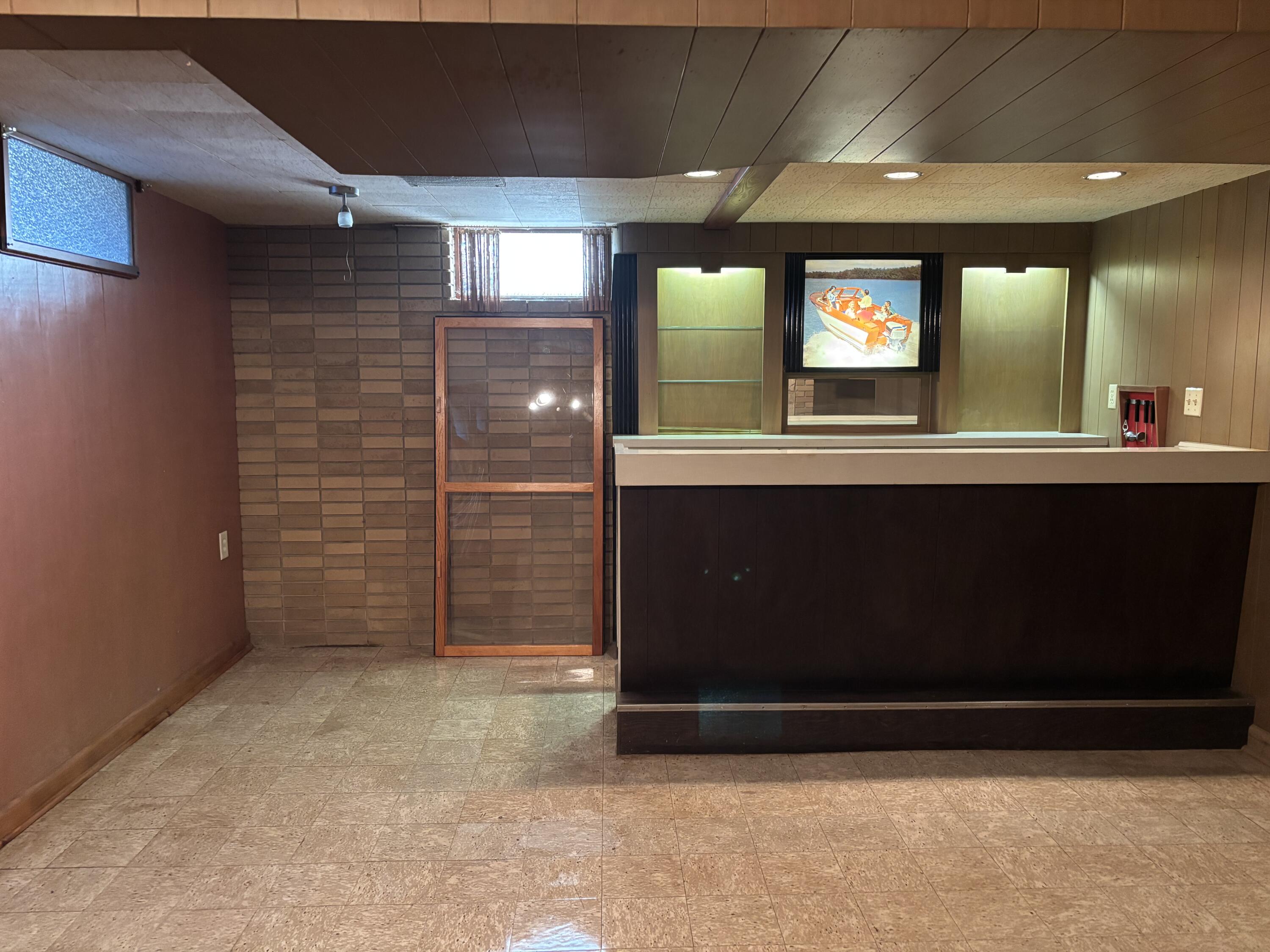 1701 West Donges Bay Road Mequon, WI 53092 - Photo 22 of 29 Rec Rm Wet Bar