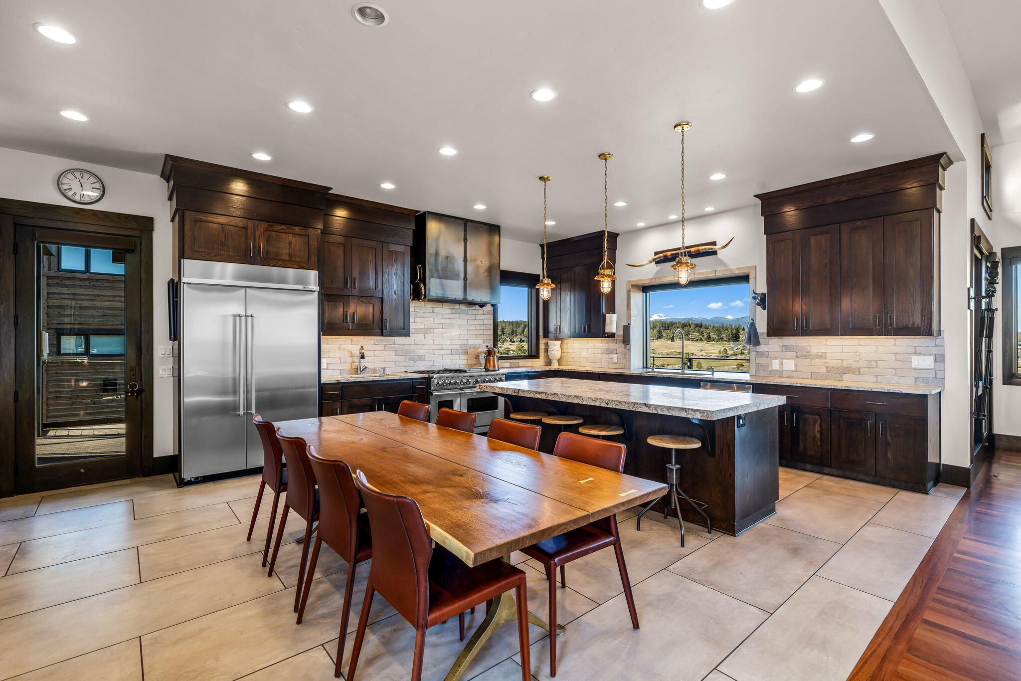19397 Alianna Loop Bend, OR 97702 - Photo 15 of 65 coffee bar, large walk-in pantry, dining area and wet-bar entertainment nook, with all areas enjoying the incredible mountain and golf course views.