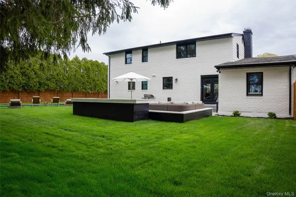 a house view with a garden space