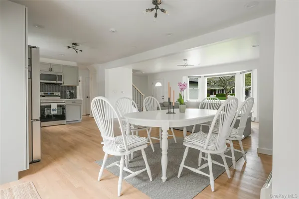 a view of a dining room with furniture