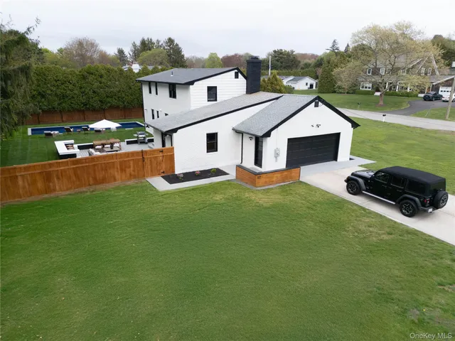 a view of a backyard of the house