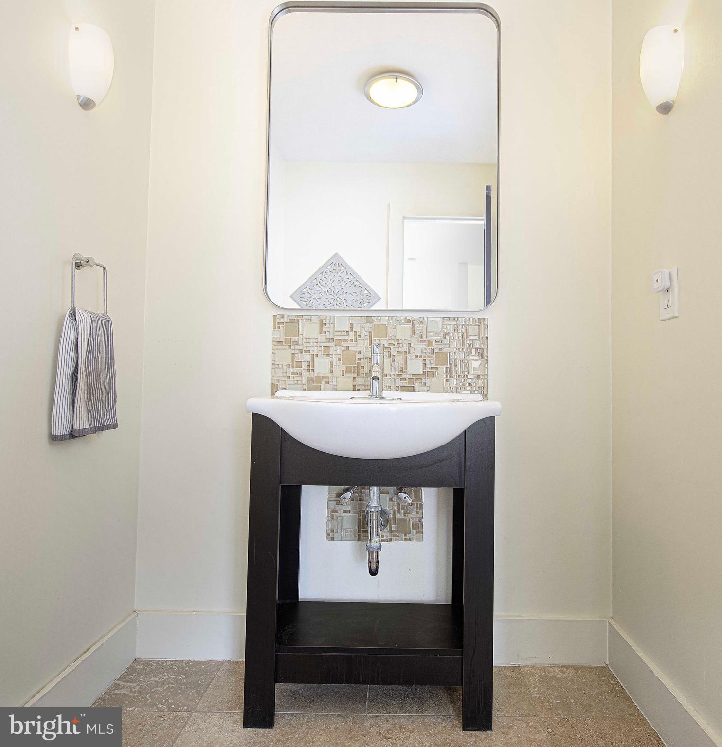 129 Duncannon Road Bel Air, MD 21014 - Photo 18 of 50 a picture of a bathroom with a sink and a mirror