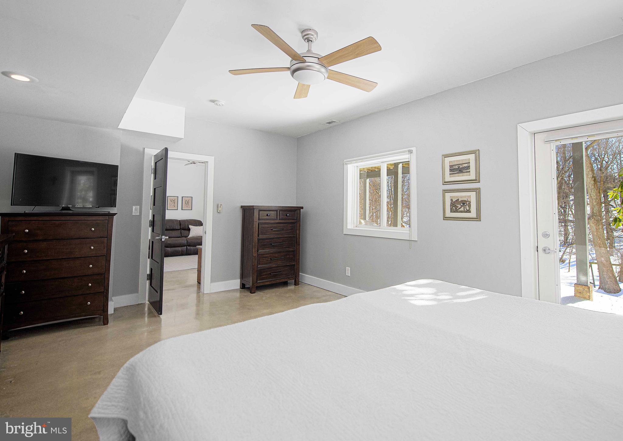 129 Duncannon Road Bel Air, MD 21014 - Photo 20 of 50 a bedroom with a bed and a flat screen tv