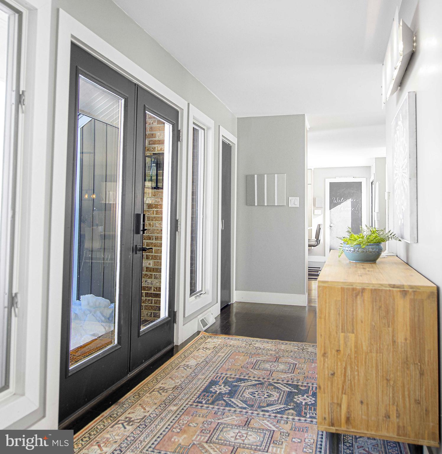129 Duncannon Road Bel Air, MD 21014 - Photo 2 of 50 a view of a hallway with wooden floor and a living room