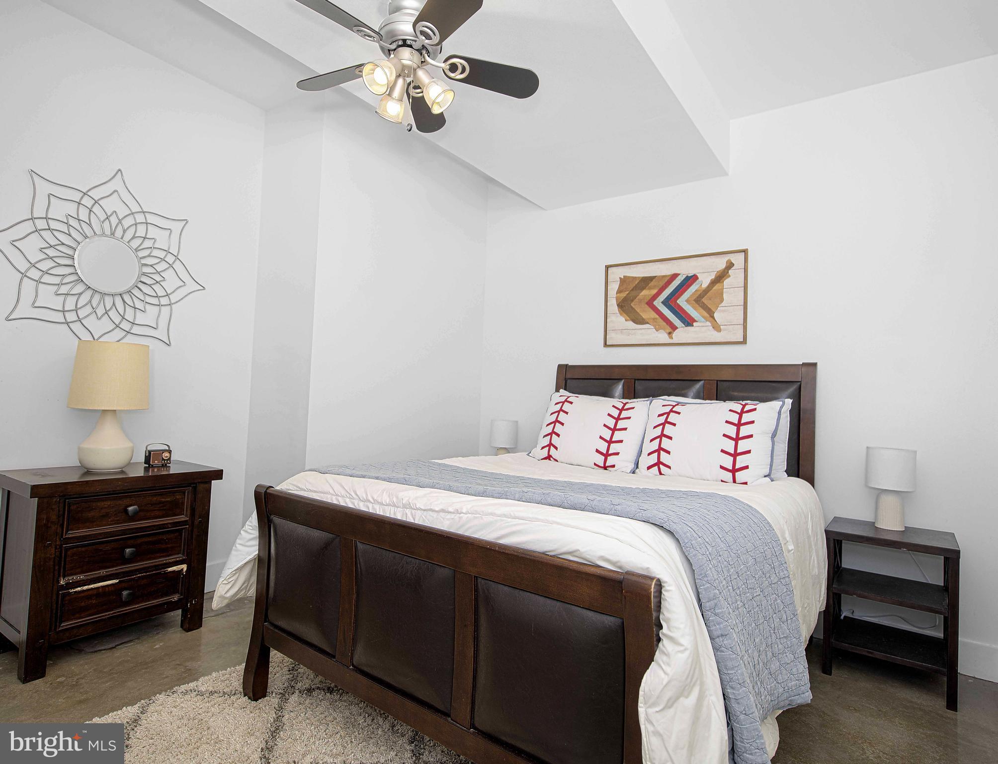 129 Duncannon Road Bel Air, MD 21014 - Photo 23 of 50 a bedroom with a bed and a lamp on dresser