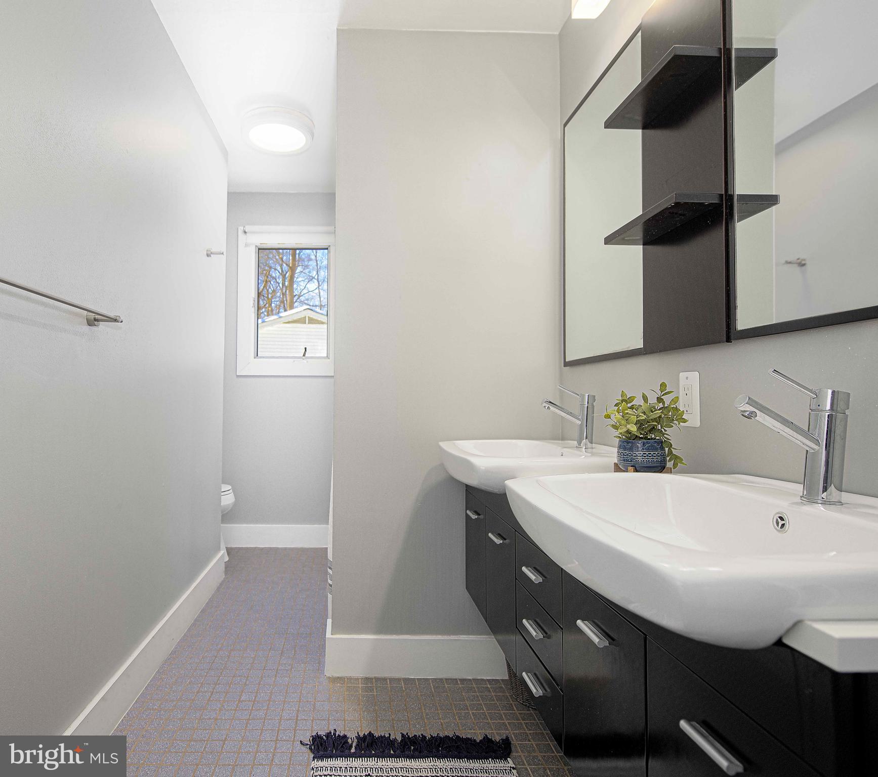 129 Duncannon Road Bel Air, MD 21014 - Photo 25 of 50 a bathroom with a sink and a mirror