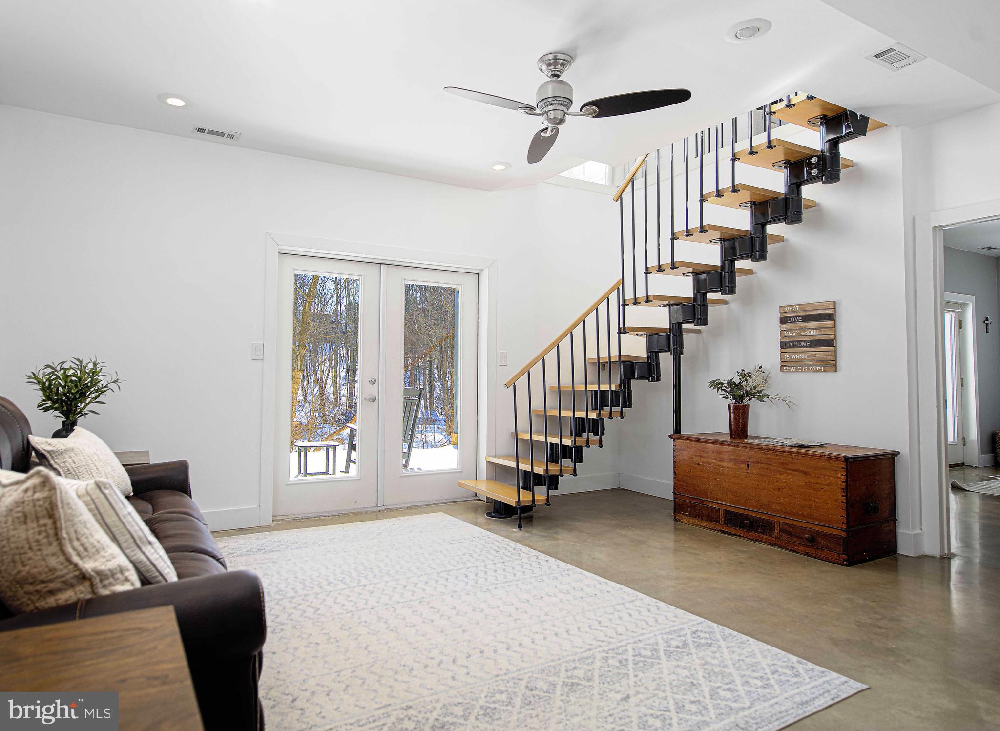 129 Duncannon Road Bel Air, MD 21014 - Photo 26 of 50 a living room with furniture and stairs with wooden floor