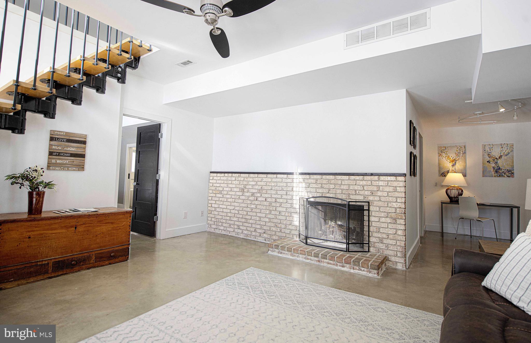 129 Duncannon Road Bel Air, MD 21014 - Photo 27 of 50 a living room with furniture and a fireplace