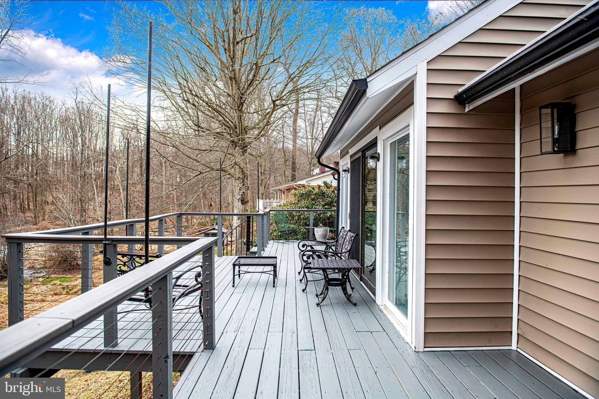129 Duncannon Road Bel Air, MD 21014 - Photo 35 of 50 a balcony with wooden floor and outdoor seating