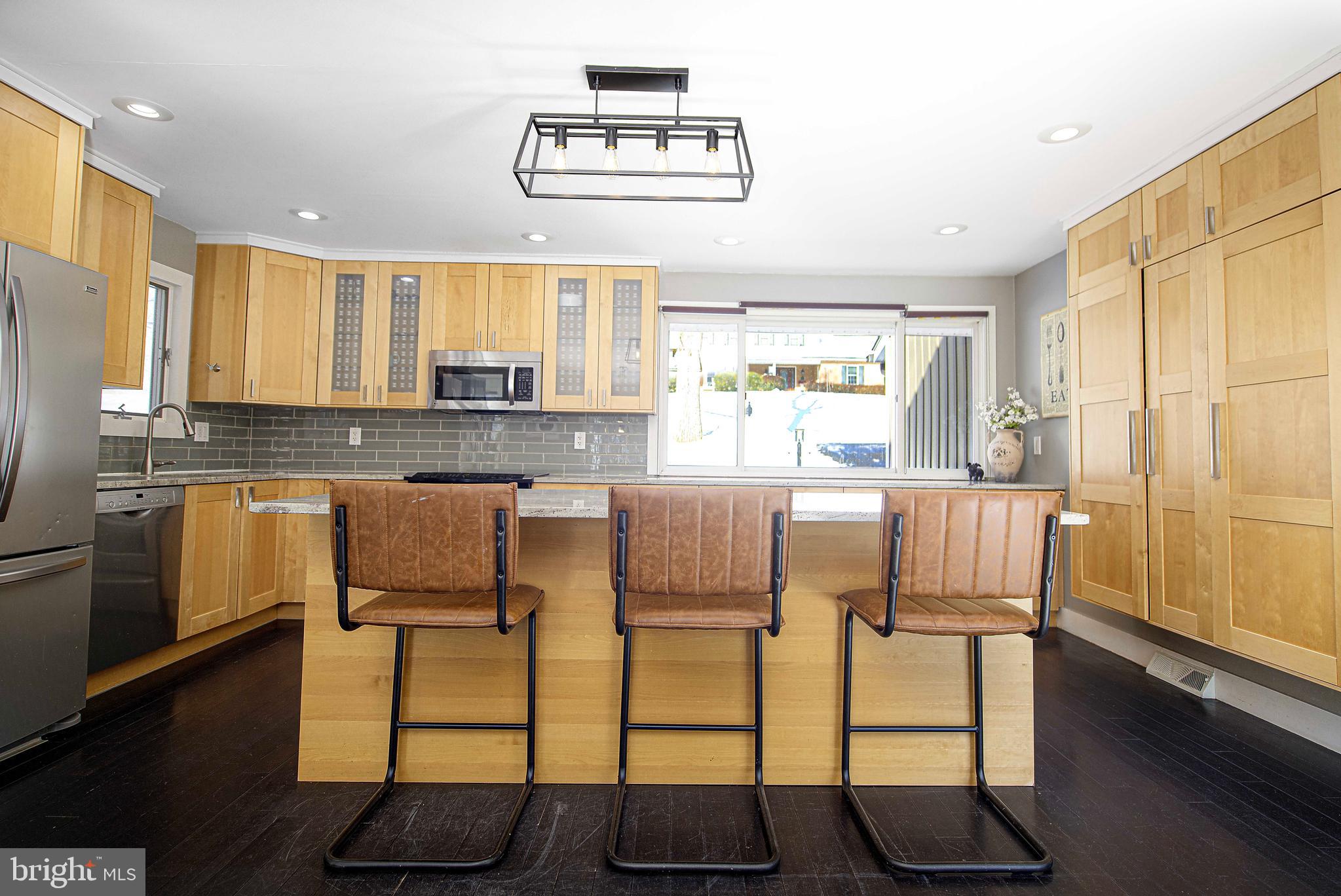 129 Duncannon Road Bel Air, MD 21014 - Photo 4 of 50 a kitchen with stainless steel appliances granite countertop a stove a sink and a refrigerator