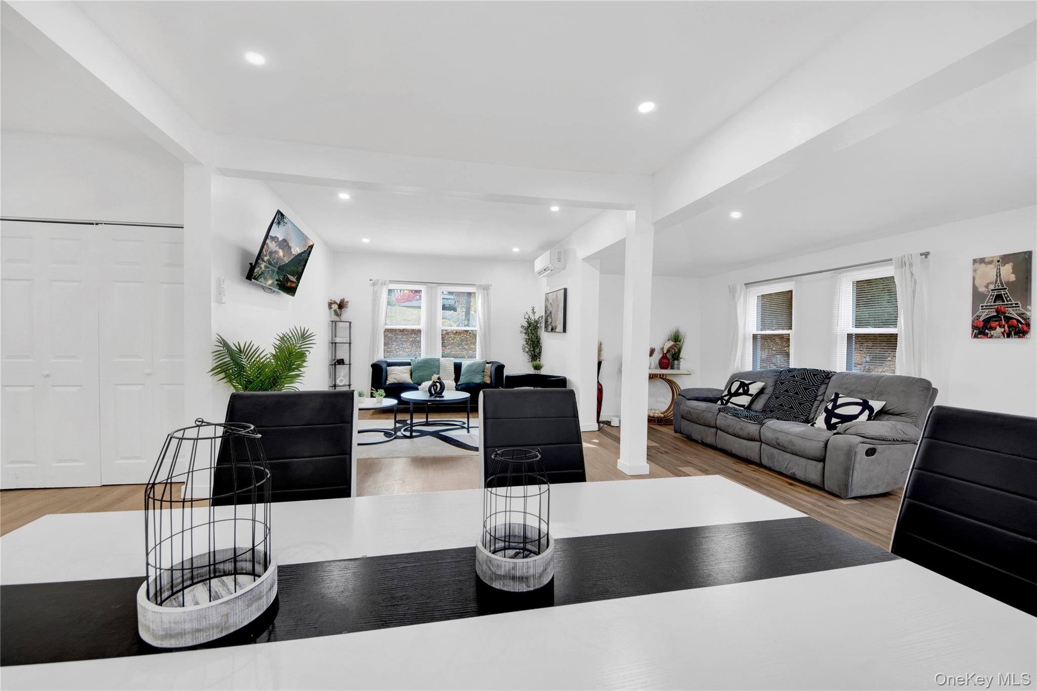 350 Old Post Road Marlboro, NY 12542 - Photo 7 of 36 a living room with furniture potted plant and wooden floor