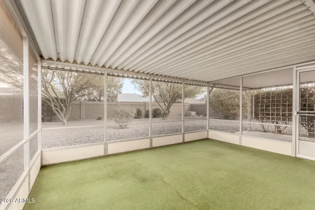 a view of a room with wooden walls