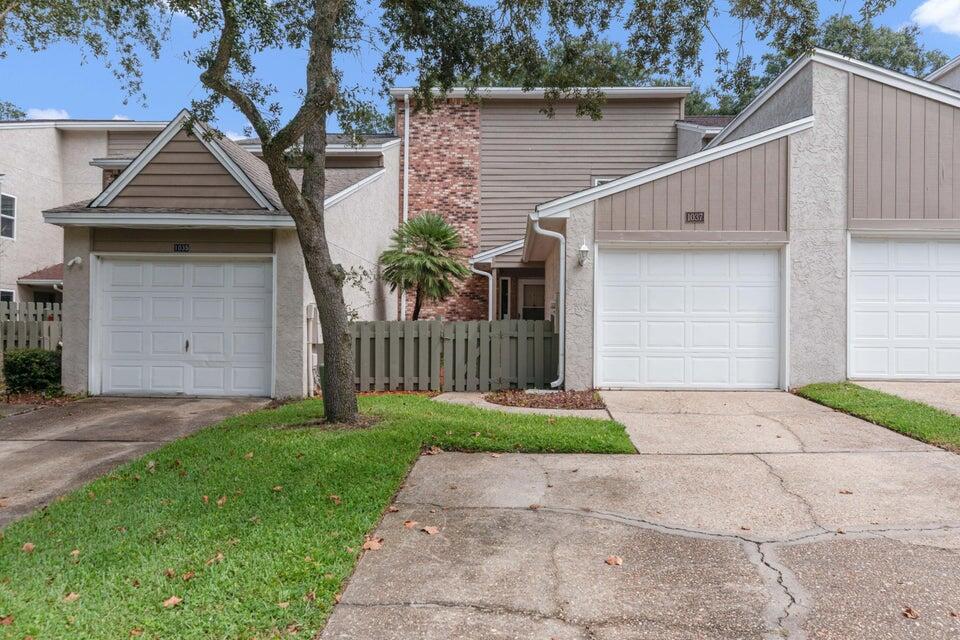 1037 4th Avenue Shalimar, FL 32579 - Photo 2 of 22 a front view of house with yard