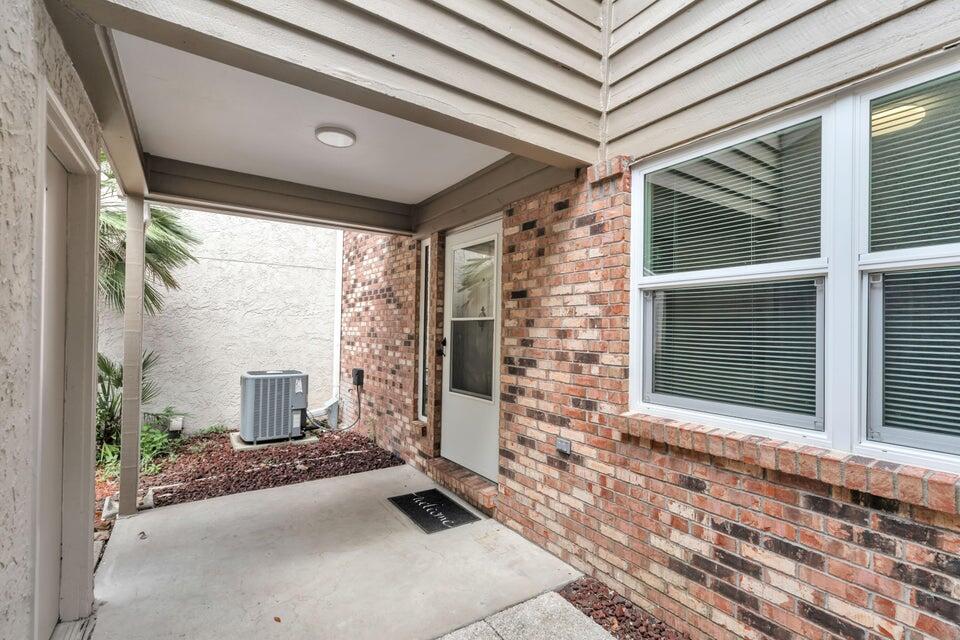 1037 4th Avenue Shalimar, FL 32579 - Photo 4 of 22 a front view of a house with a yard