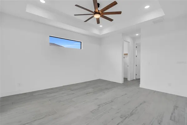 an empty room with fan