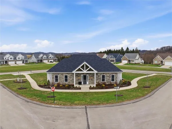 a view of a swimming pool with a yard