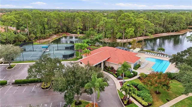an aerial view of house with yard