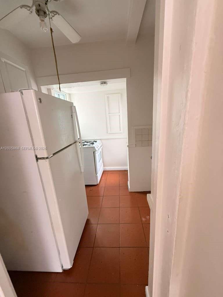 1919 Southwest 2nd Street, Unit B Miami, FL 33135 - Photo 8 of 12 a bathroom with a sink and a shower