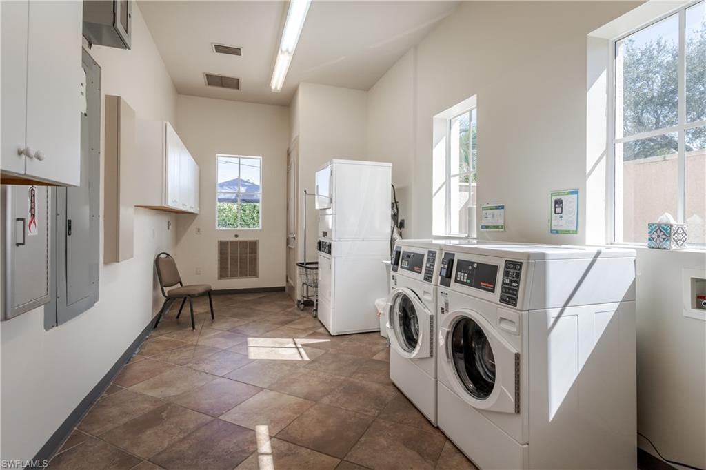 13580 Snook Circle Naples, FL 34114 - Photo 33 of 33 a utility room with dryer and washer