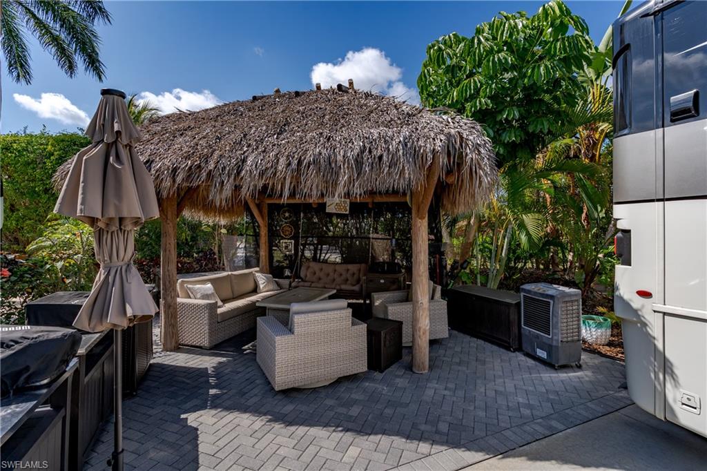 13580 Snook Circle Naples, FL 34114 - Photo 7 of 33 a view of outdoor space yard and patio