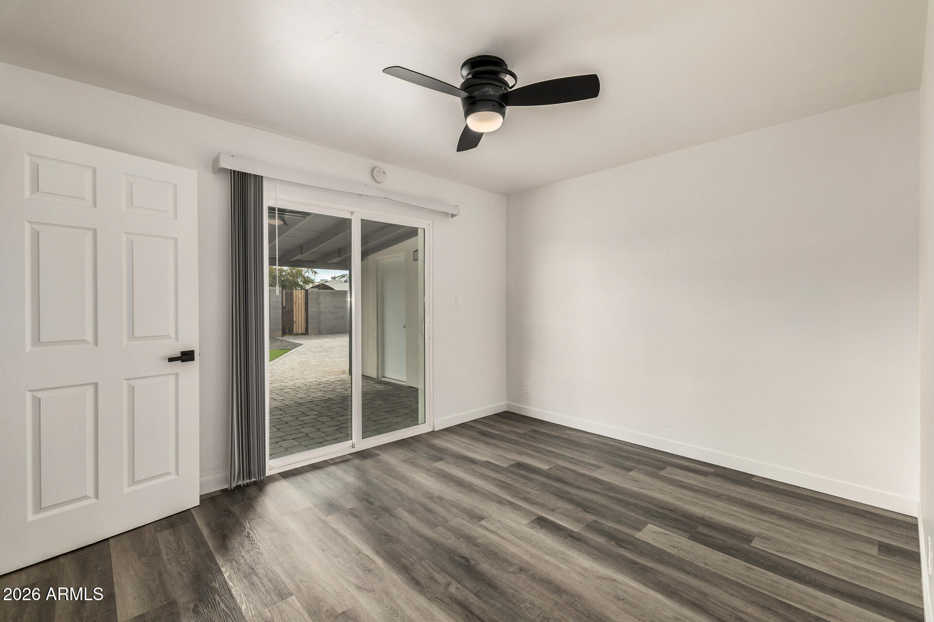 533 West 18th Street Tempe, AZ 85281 - Photo 29 of 52 a view of empty room with wooden floor