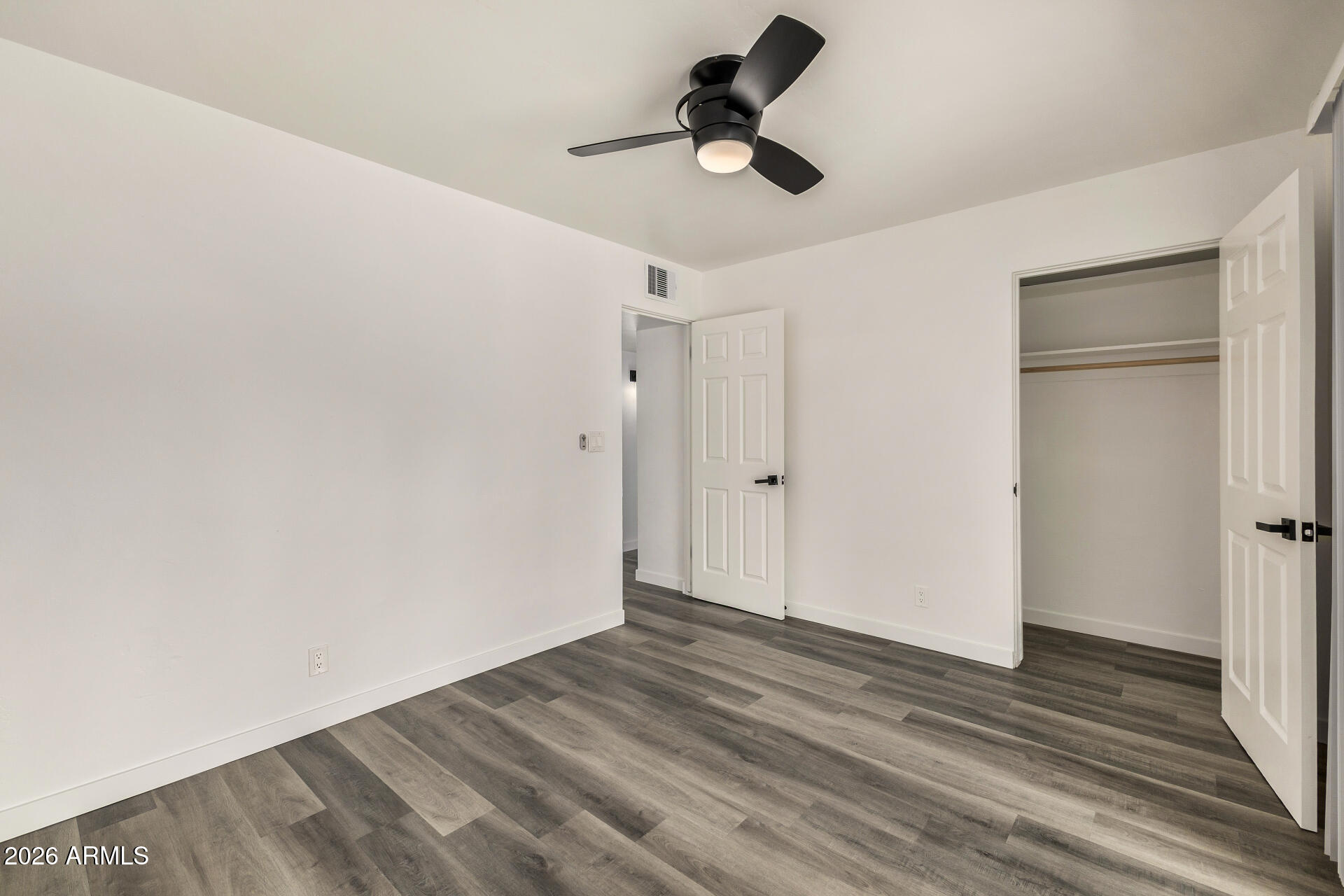 533 West 18th Street Tempe, AZ 85281 - Photo 30 of 52 a view of empty room with wooden floor