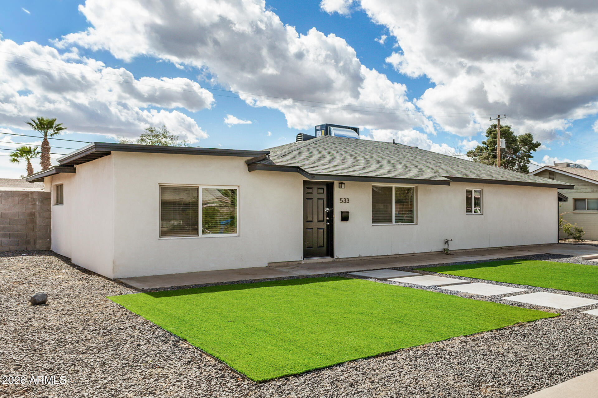 533 West 18th Street Tempe, AZ 85281 - Photo 4 of 52 a view of a backyard with a garden
