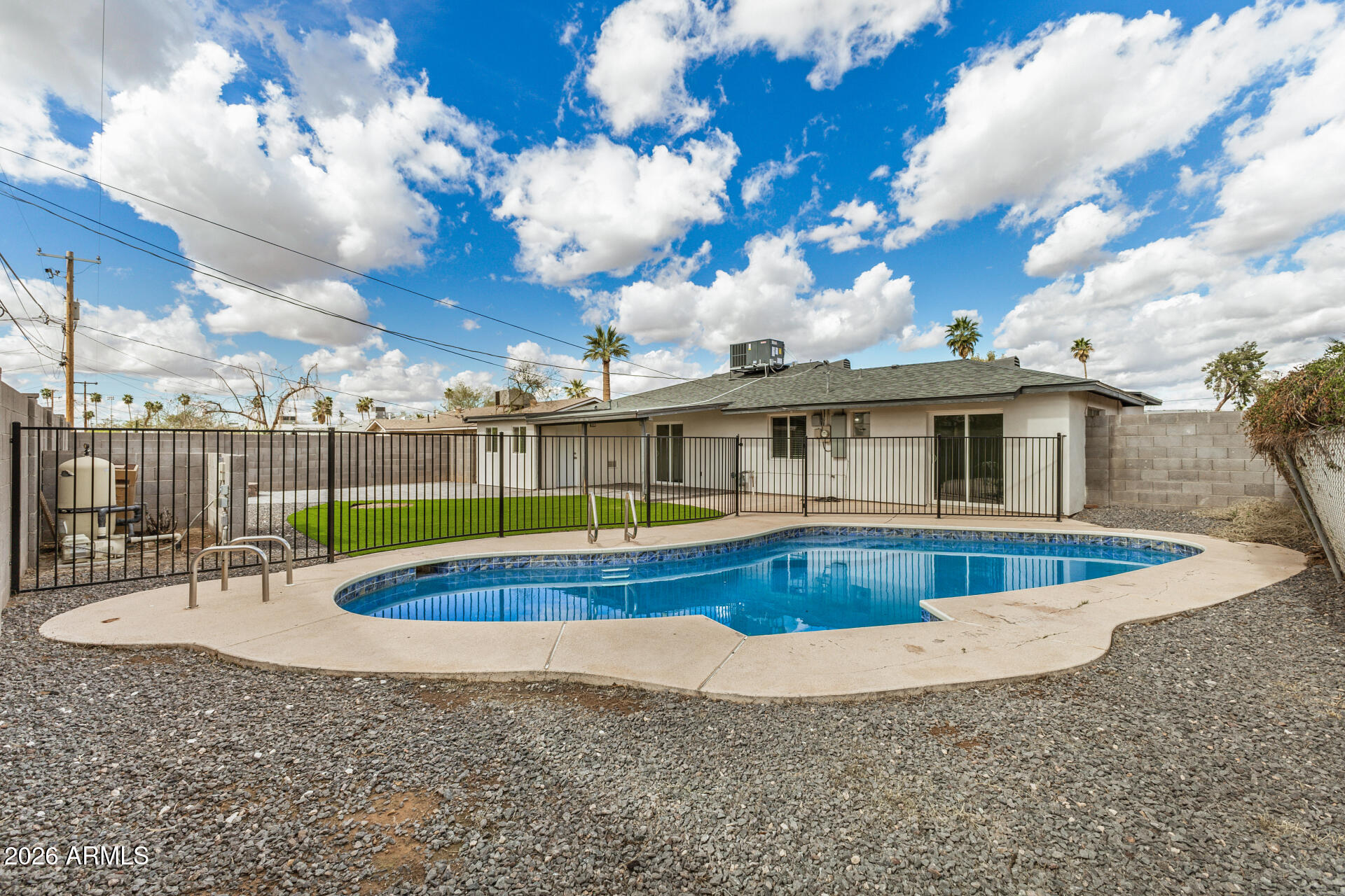 533 West 18th Street Tempe, AZ 85281 - Photo 50 of 52 a view of a house with a swimming pool