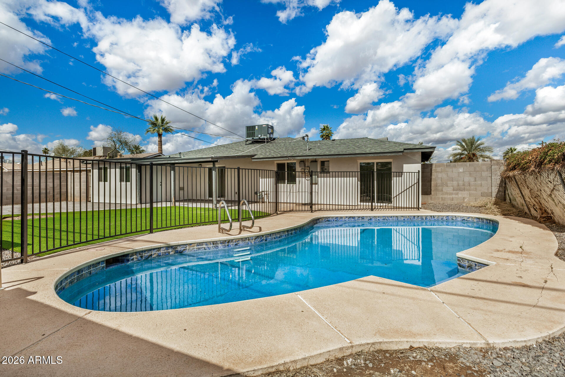 533 West 18th Street Tempe, AZ 85281 - Photo 51 of 52 a view of a house with a swimming pool