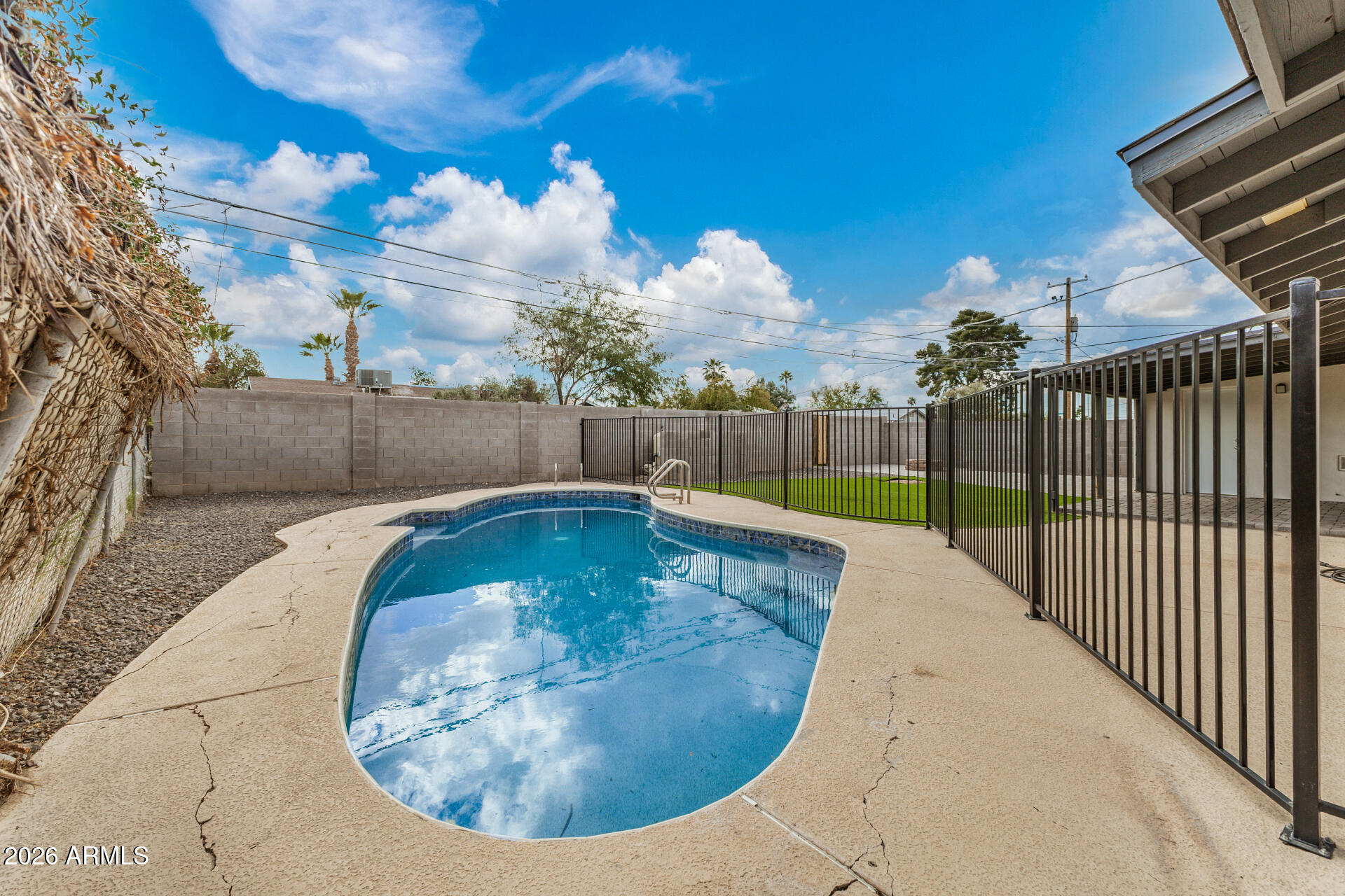533 West 18th Street Tempe, AZ 85281 - Photo 52 of 52 a view of a swimming pool with a yard from a balcony
